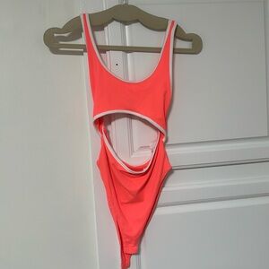 Neon pink open bodysuit. Size small.